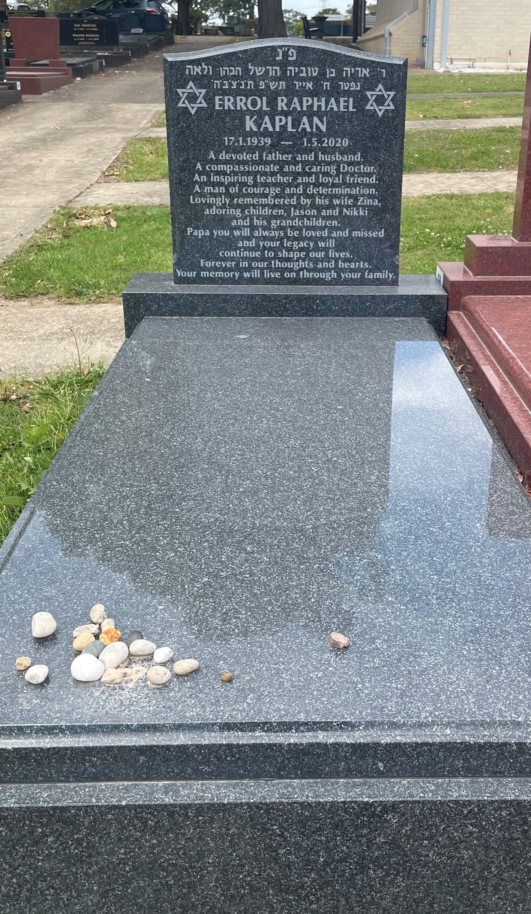 Single monument with Noble Grey granite and natural cut-in lettering.