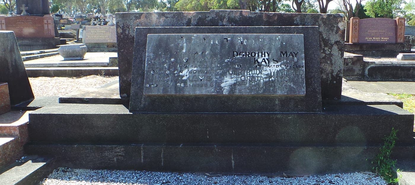 Eroded marble plaque — inscription no longer legible